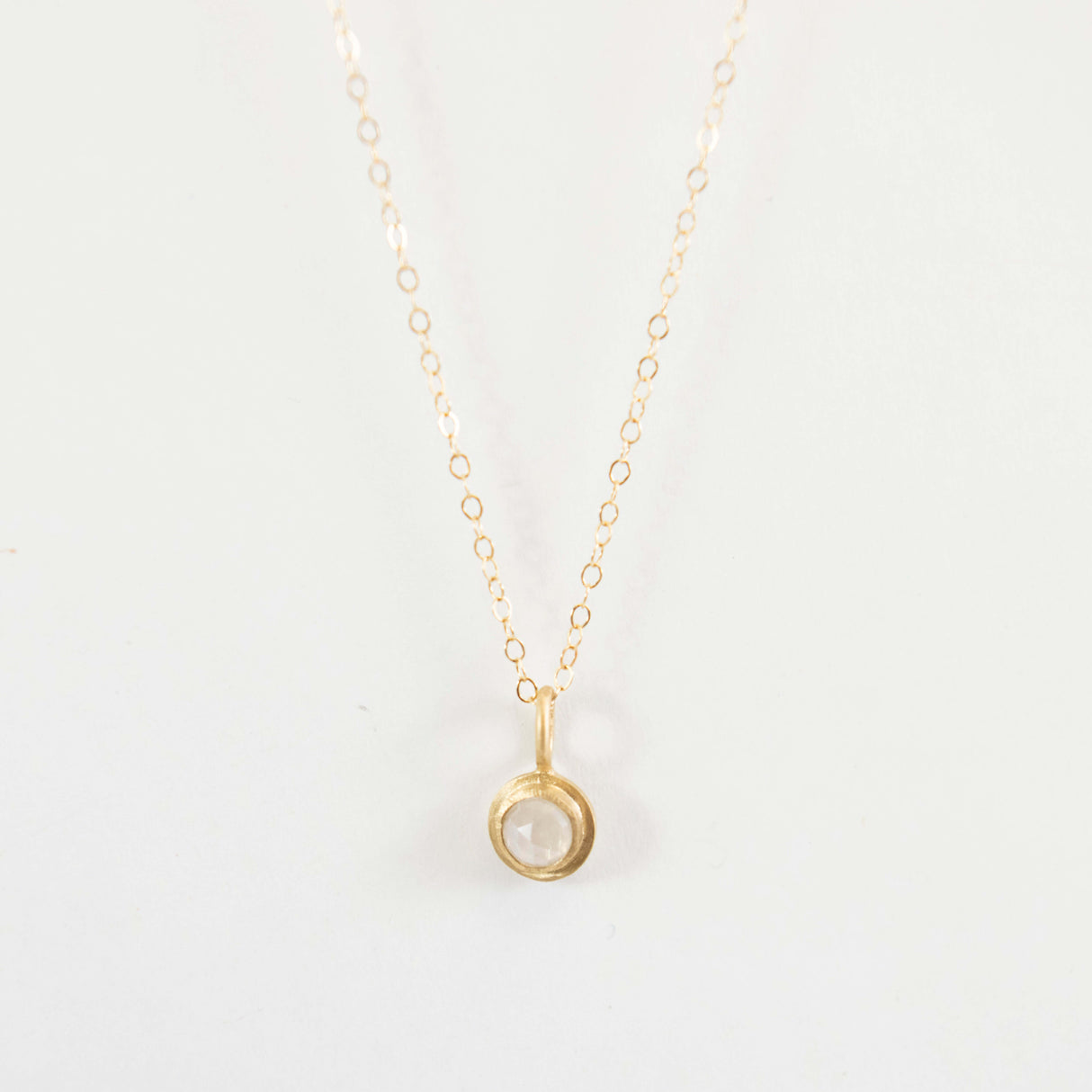 5mm Moonstone Cabochon Charm in 14k Gold at PINCH