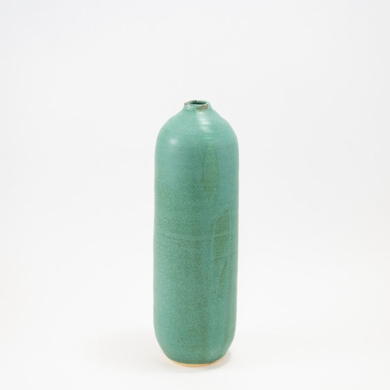 Small Tall Weathered Green Bottle Vase from Judy Jackson at Pinch in Northampton, MA