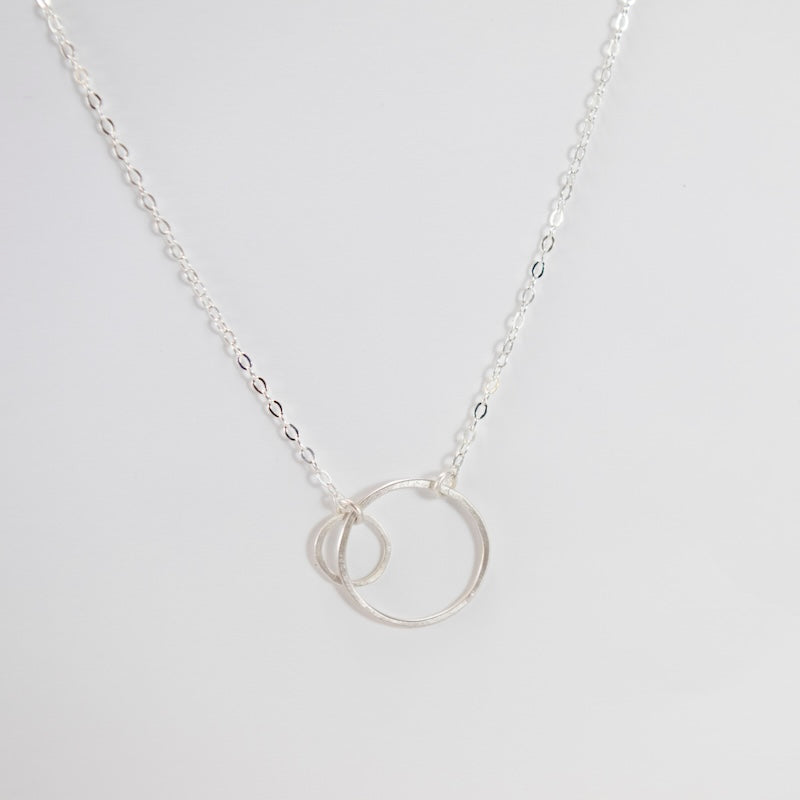 Open Circles Necklace with Tiny & Small Circles in Sterling Silver from Emily Rosenfeld at Pinch in Northampton, MA