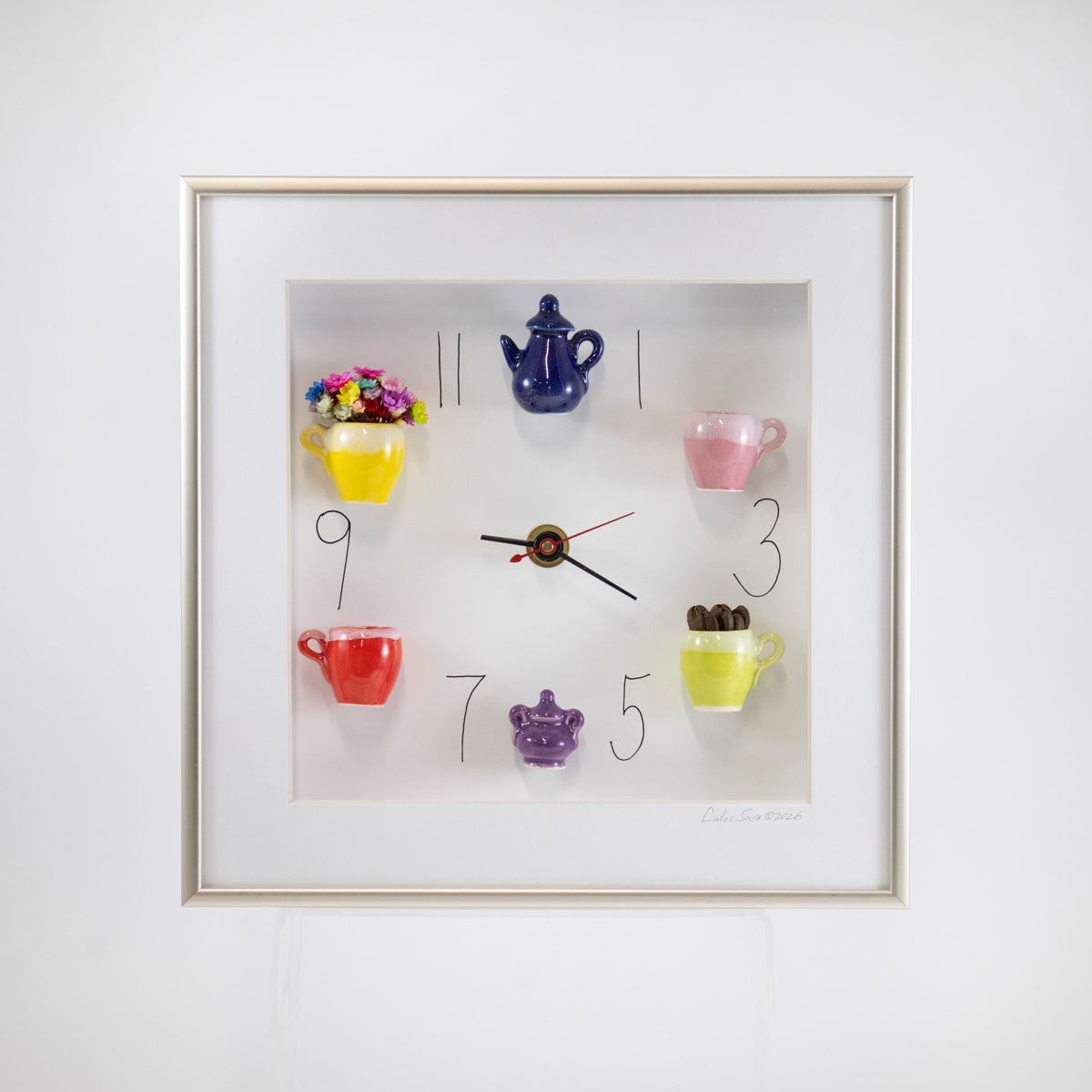 10x10 Clock with a Blue Teapot, Purple Sugar Jar, Flowers, and Coffee Beans in a Silver Frame