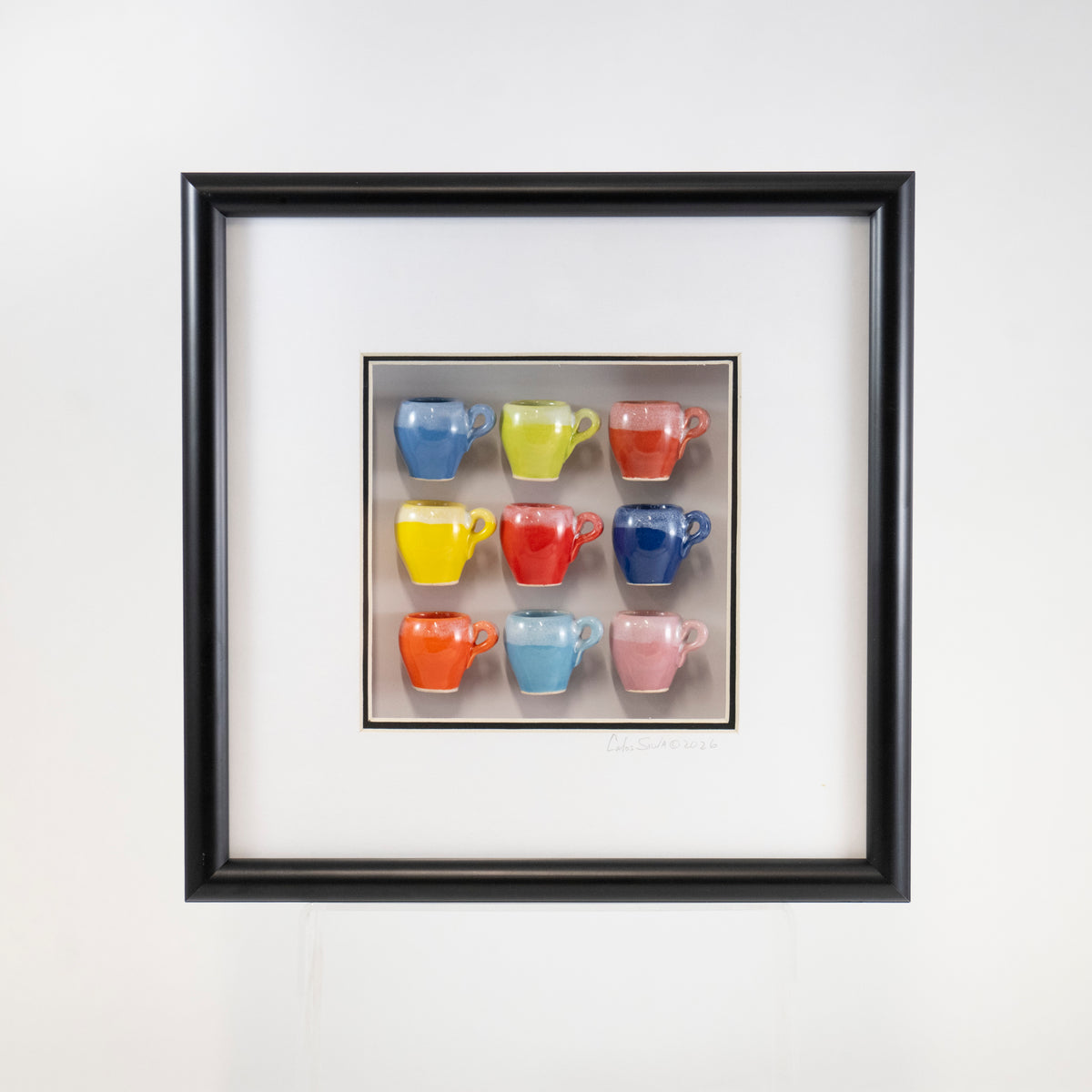 10x10 Shadow Box with a Red Mug in a Black Frame