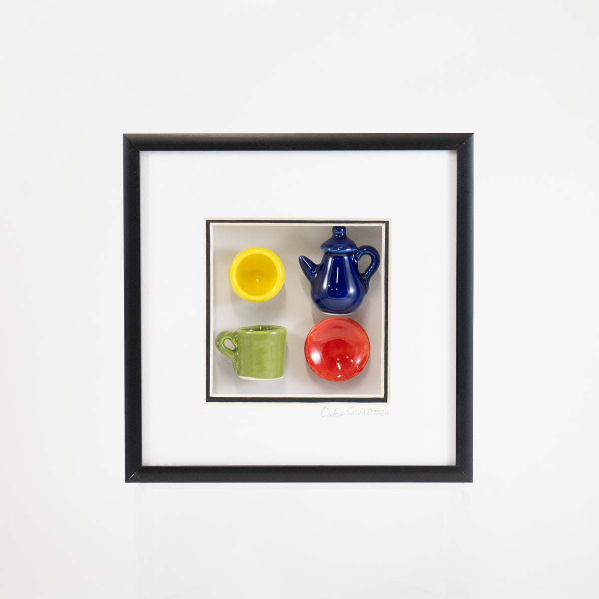 6x6 Shadowbox with a Blue Teapot and Green Mug in a Black Frame