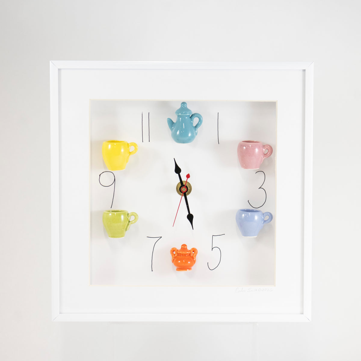 10x10 Clock with Teal Teapot and Orange Sugar Jar in a White Frame