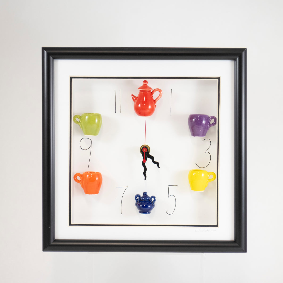 10x10 Clock with a Red Teapot and Blue Sugar Jar in a Black Frame
