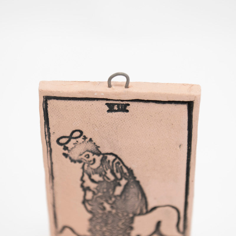 Strength Ceramic Hanging Tarot Card from Mud Wizards at Pinch in Northampton, MA