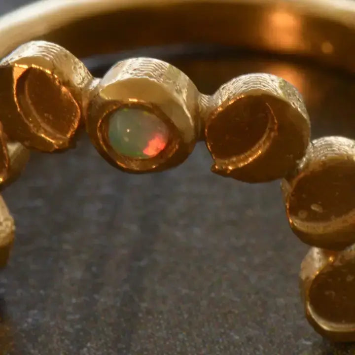Whisper of the Moons Ring in Bronze with White Opal