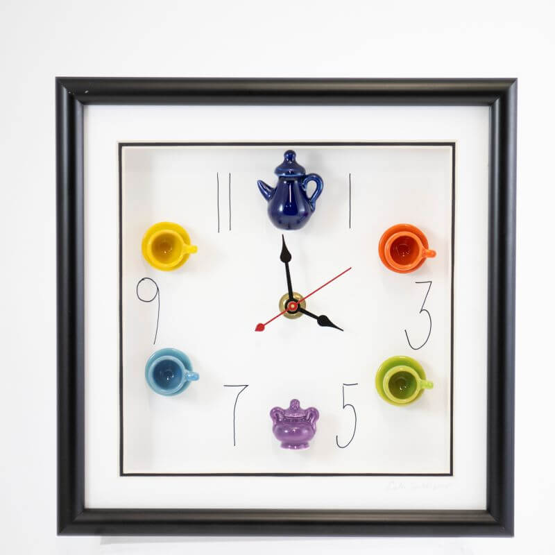 10x10 Clock with a Navy Teapot and Multicolor Teacups in a Black Frame