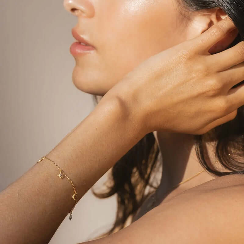 Star & Moon Charm Bracelet from Satya at Pinch in Northampton, MA