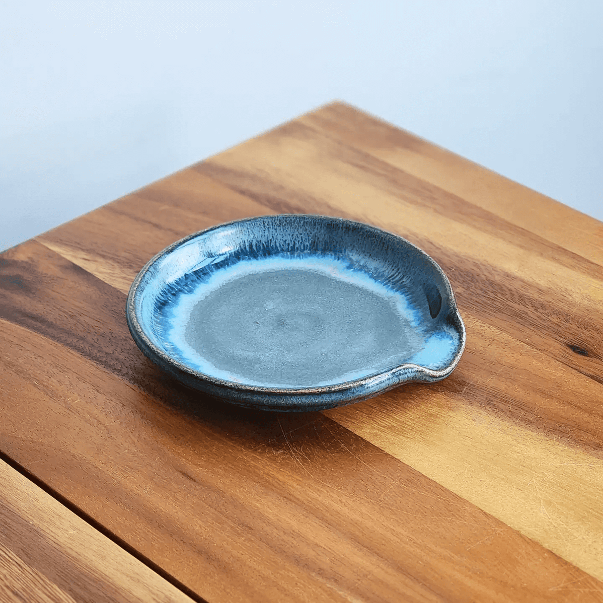 Spoon Rest in Lakeshore Grey Glaze from Dock 6 Pottery at Pinch in Northampton, MA