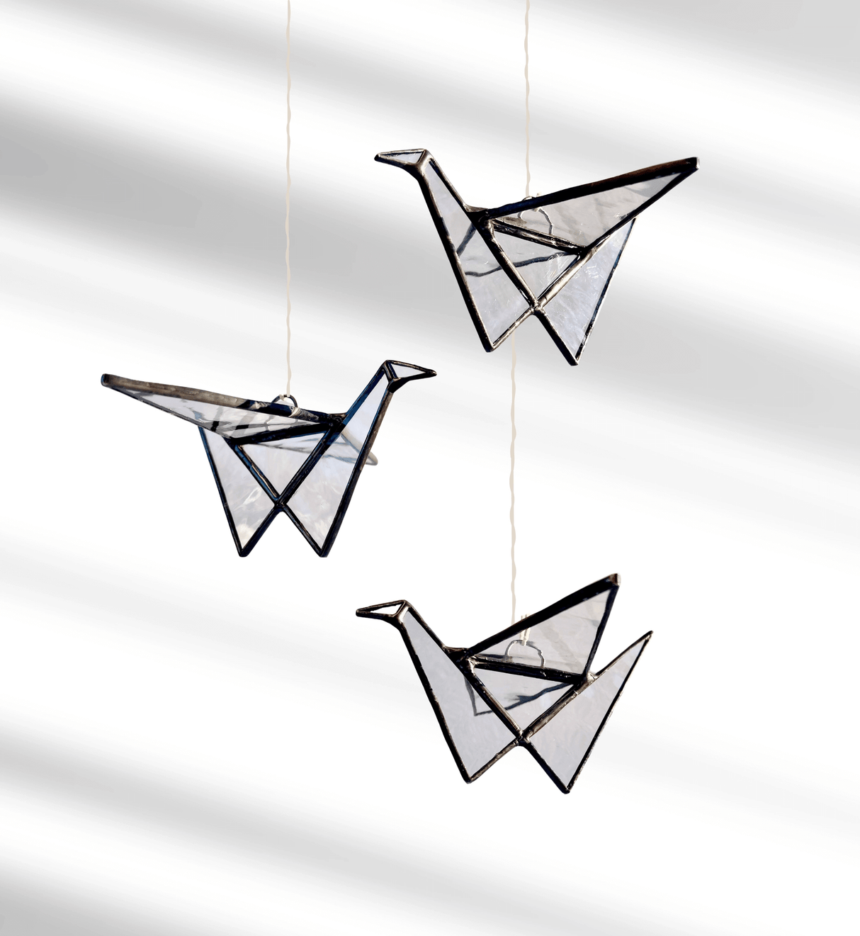 Stained Glass Origami Crane Suncatcher in Clear from Samara Designs Studio at Pinch in Northampton, MA