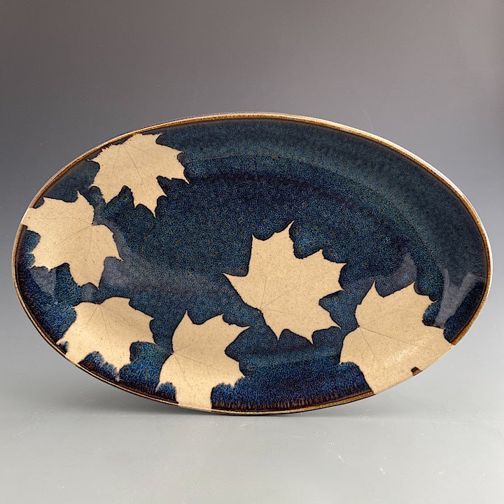 Large Oval Plate in Dark Blue Glaze with Maple from Kaleidoscope Pottery at Pinch in Northampton, MA