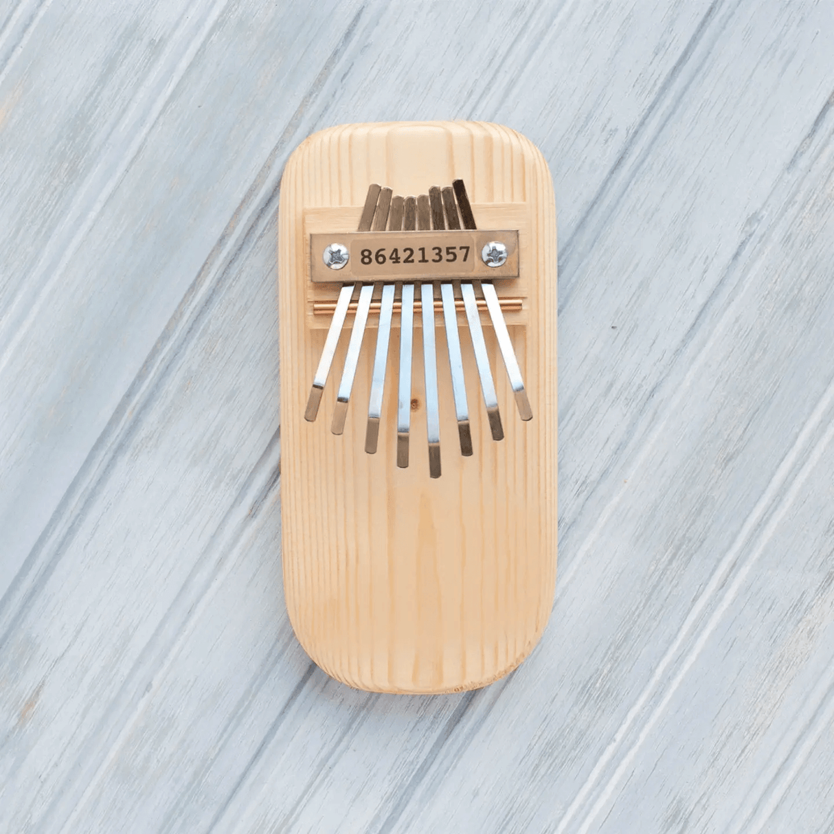 Natural Pine Thumb Piano at PINCH