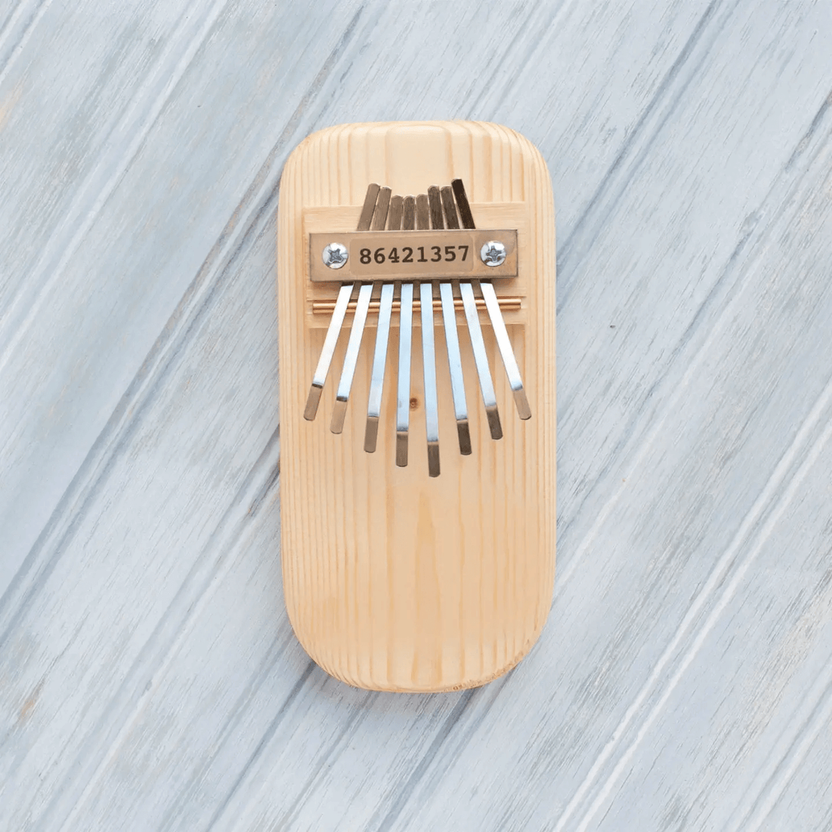 Natural Pine Thumb Piano at PINCH