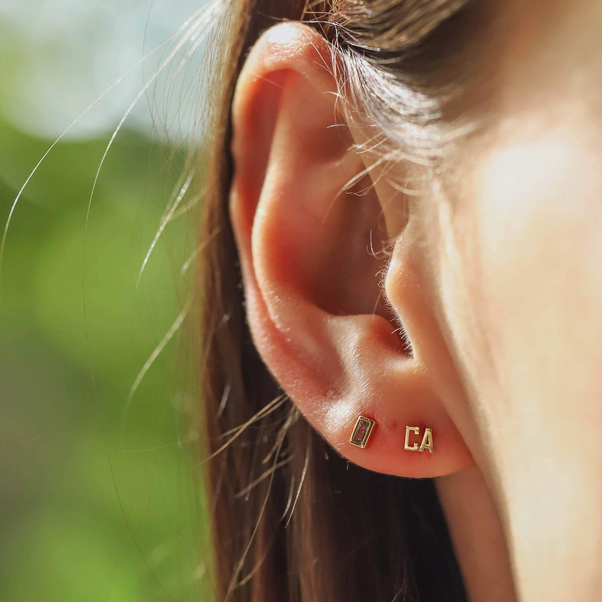 Gold Trim Emerald Stud Earrings
