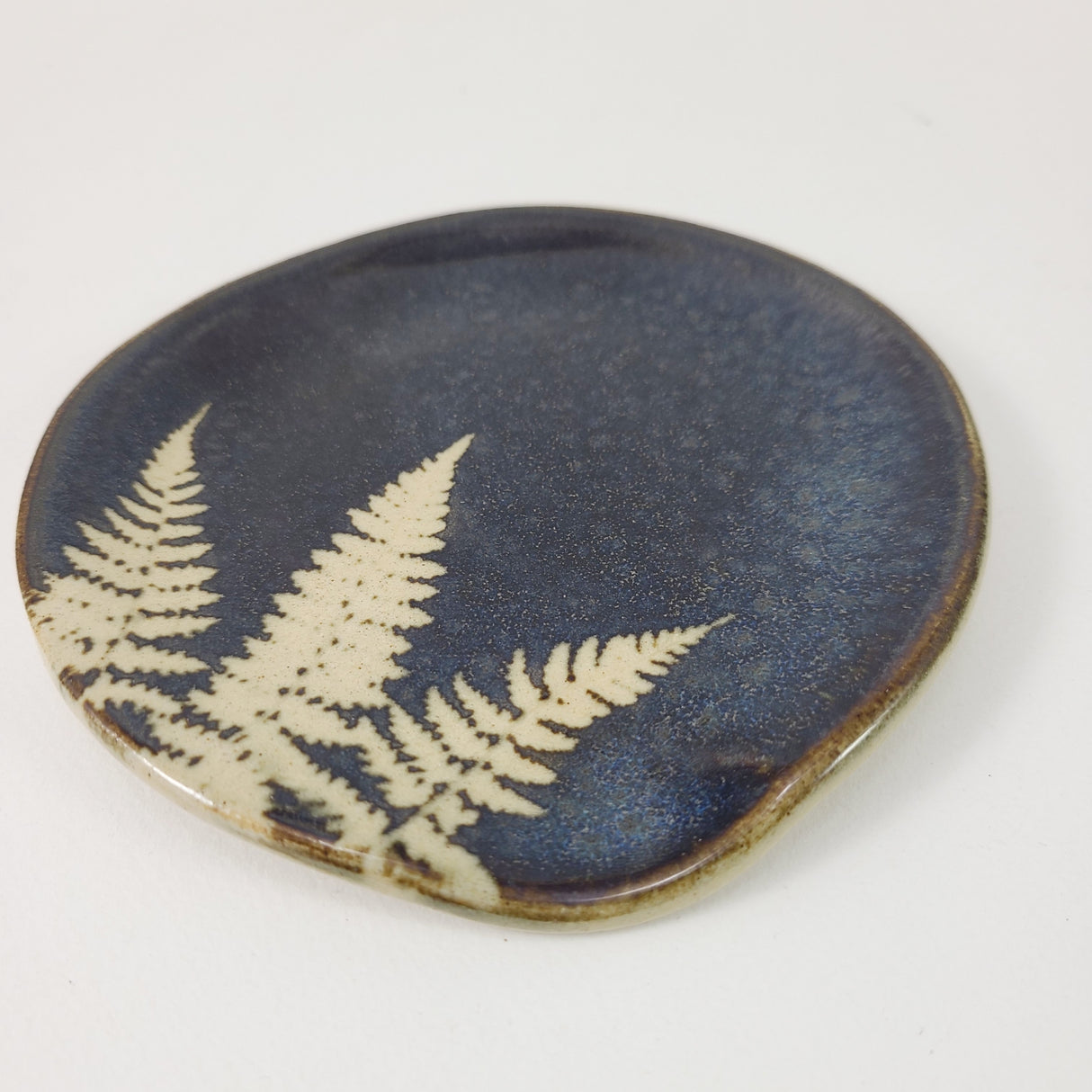 Fern Spoonrest in Dark Blue Glaze from Kaleidoscope Pottery at Pinch in Northampton, MA