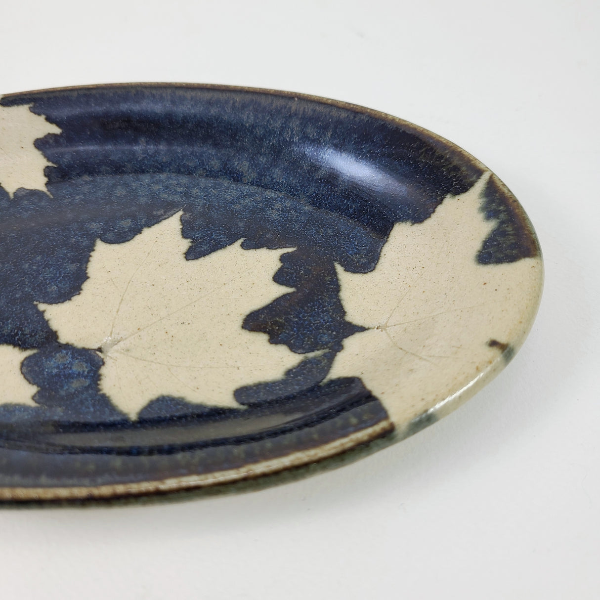 Maple Dark Small Oval Plate from Kaleidoscope Pottery at Pinch in Northampton, MA