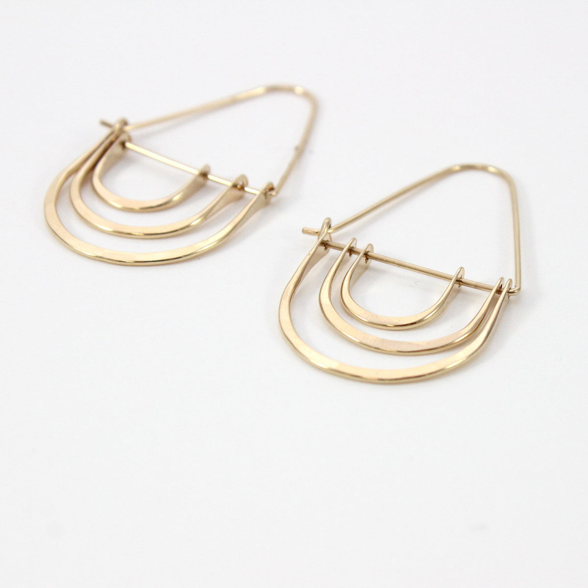 Pendientes de triple arco