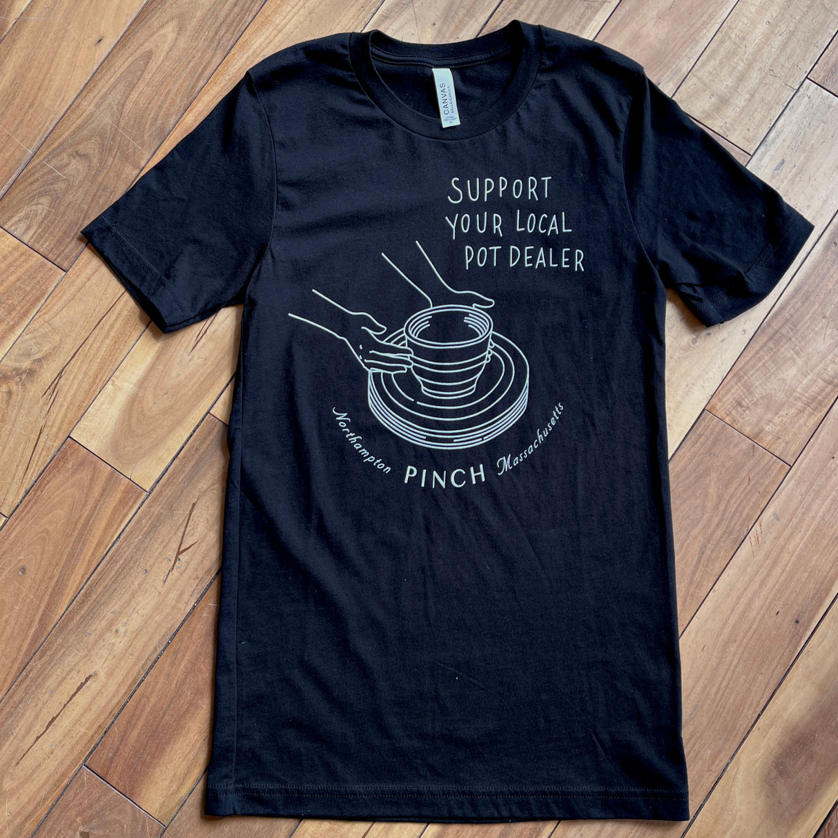 T-Shirt Support Your Local Pot Dealer in Black with White Ink from Pinch at Pinch in Northampton, MA