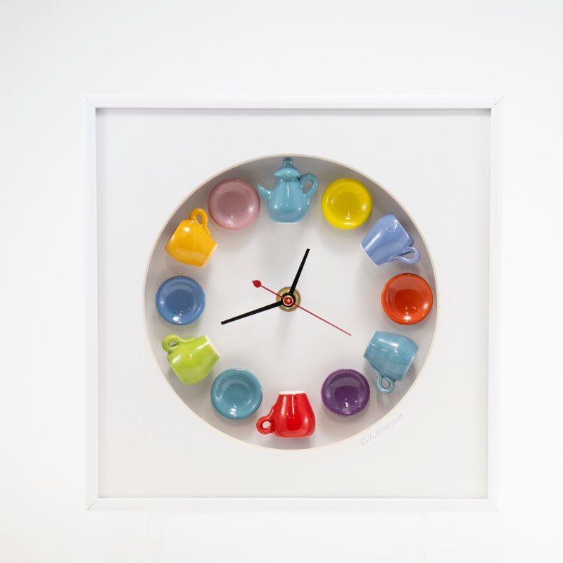 10x10 Clock with a Blue Teapot in a Round Matte and White Frame