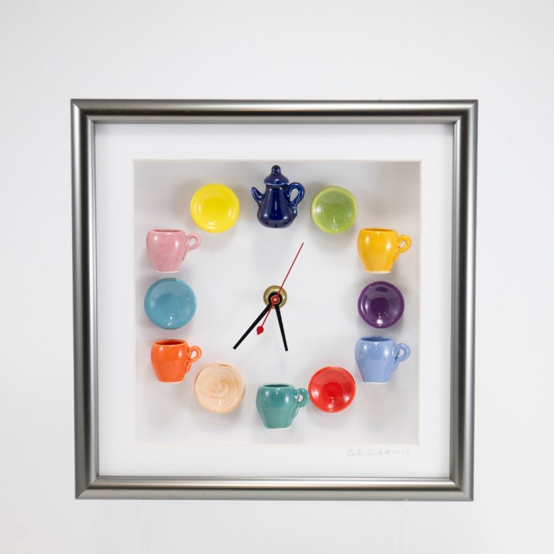 10x10 Clock with Navy Teapot and Multi Colored Mugs and Plates in a Silver Frame