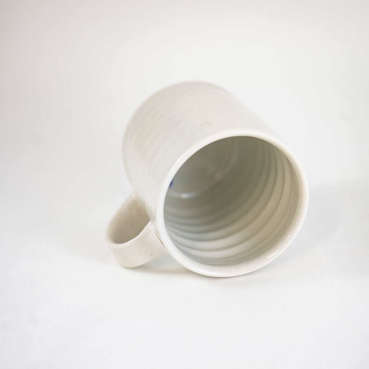 White Mug by Mark Shapiro