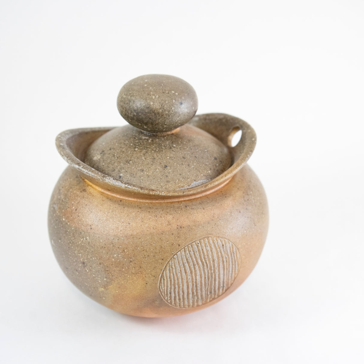 Round Bellied Ochre Canister by Maya Machin