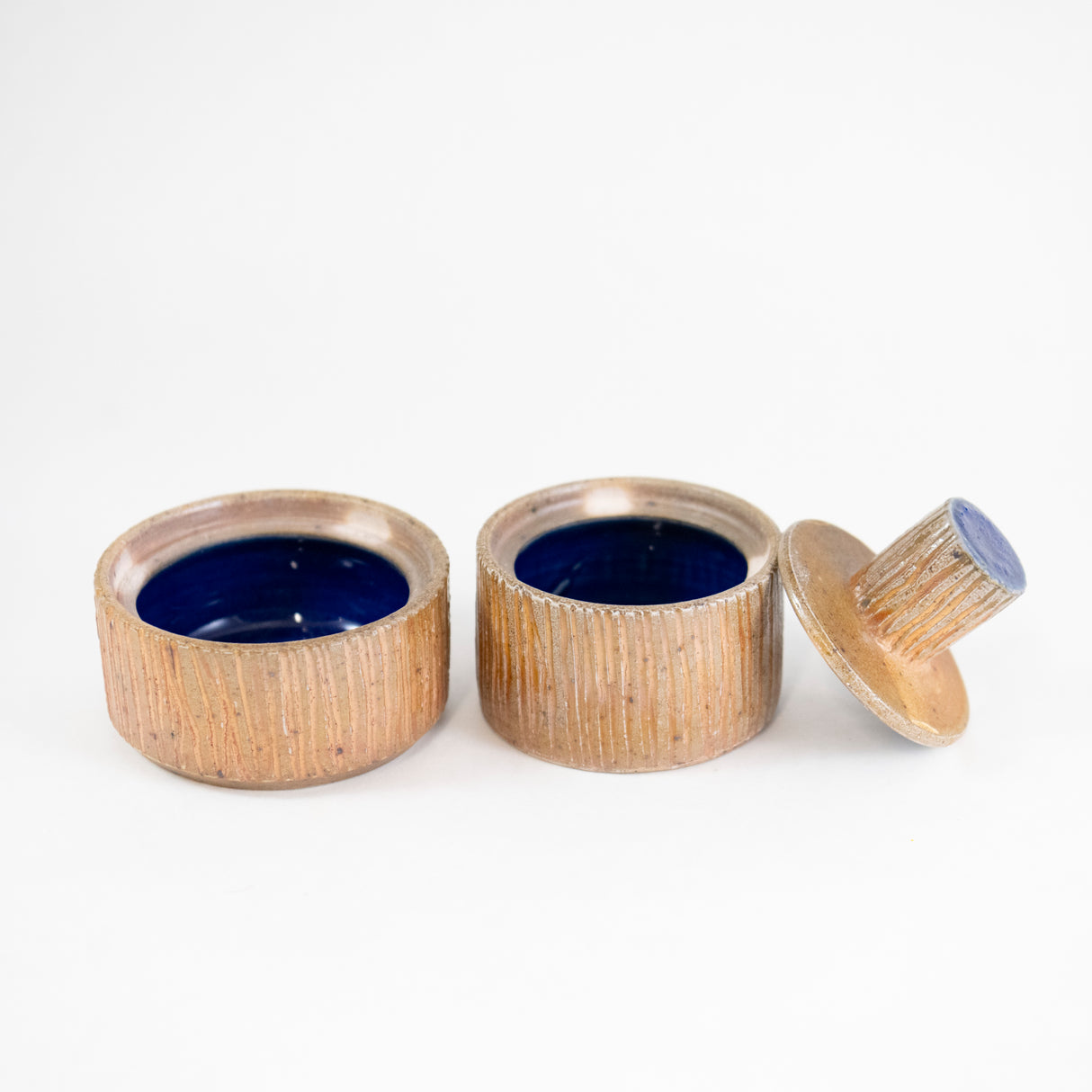 Small Stacking Canister Set in Ochre by Maya Machin