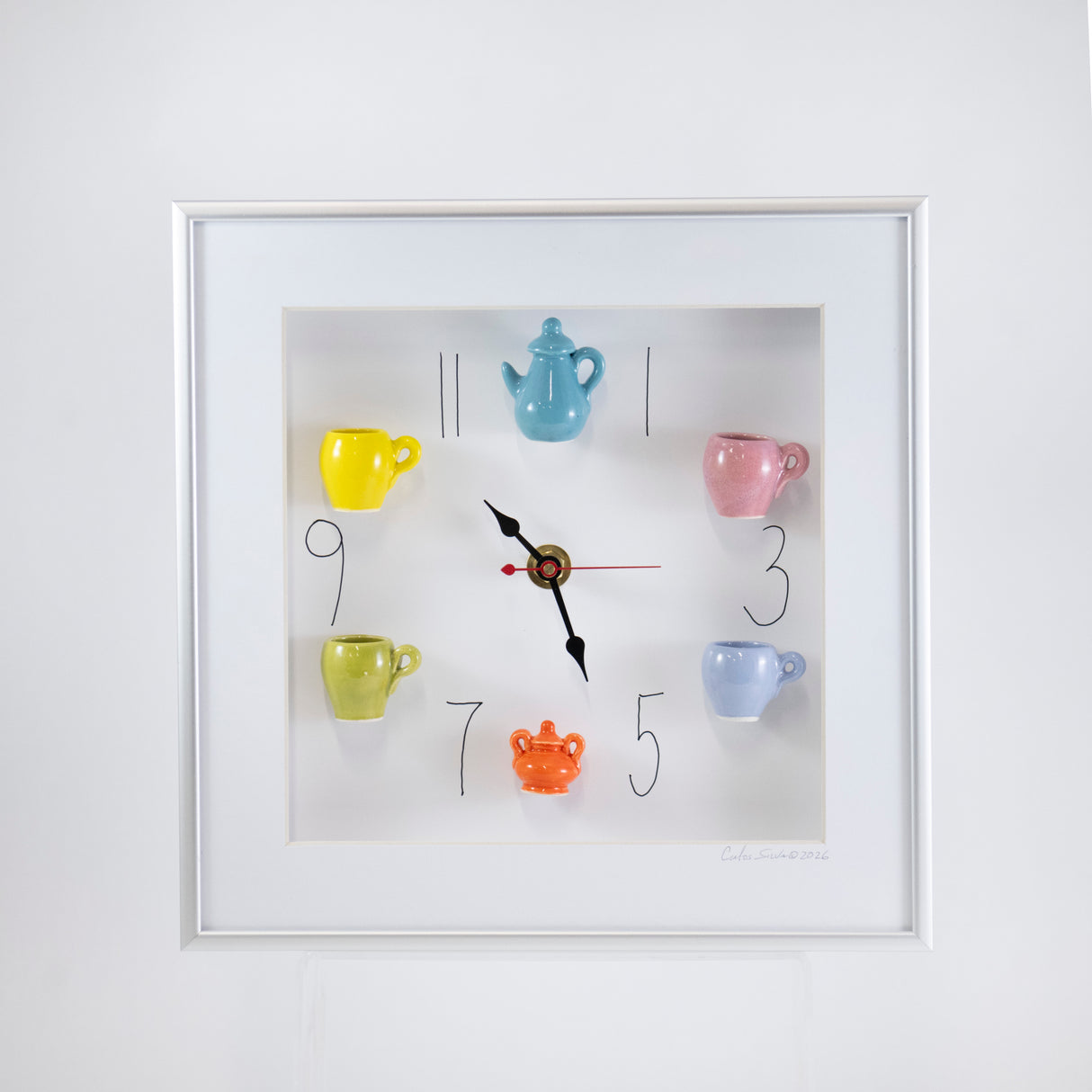 10x10 Clock with aTeal Teapot and an Orange Sugar Jar in a Silver Frame