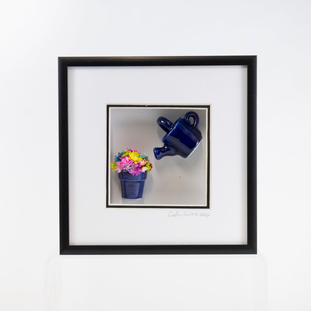 6x6 Shadowbox with a Blue Watering Can and Pot and Colorful Flowers in a Black Frame