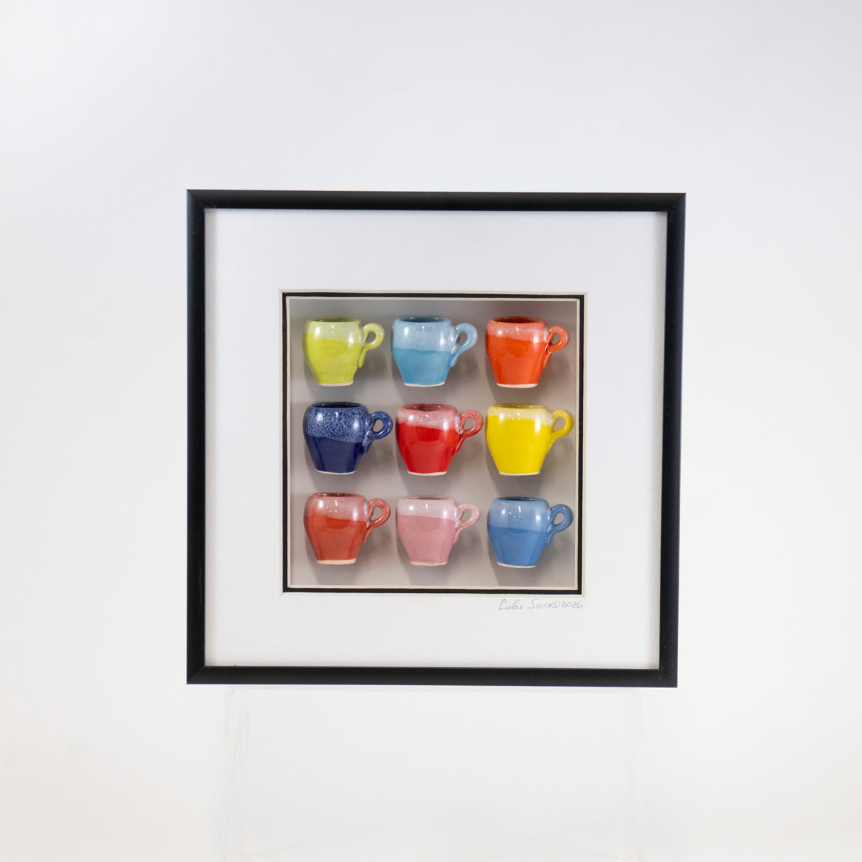 8x8 Shadowbox with Green, Red, Blue Mugs in a Black Frame