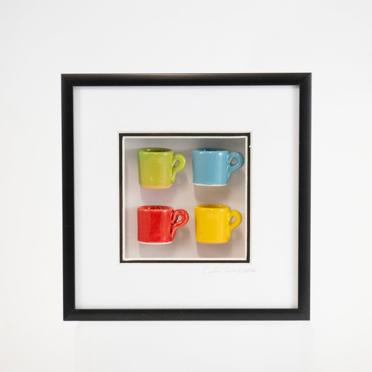 6x6 Shadowbox with Green and Yellow Mugs in a Black Frame