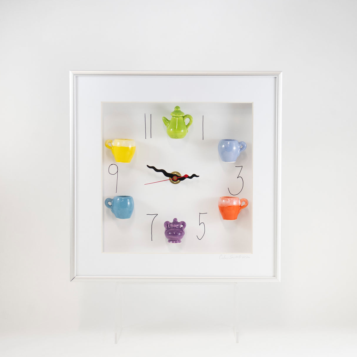 10x10 Clock with a Green Teapot and Purple Sugar Jar in a Silver Frame