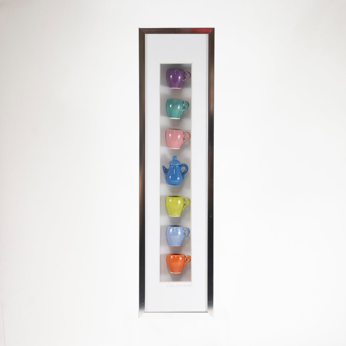 4x16 Vertical Shadowbox with a Blue Teapot and Pink Mug in a Silver Frame