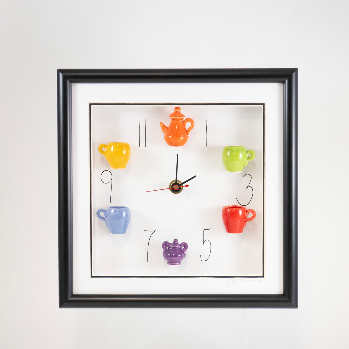 10x10 Clock with an Orange Teapot and Purple Sugar Jar in a Black Frame