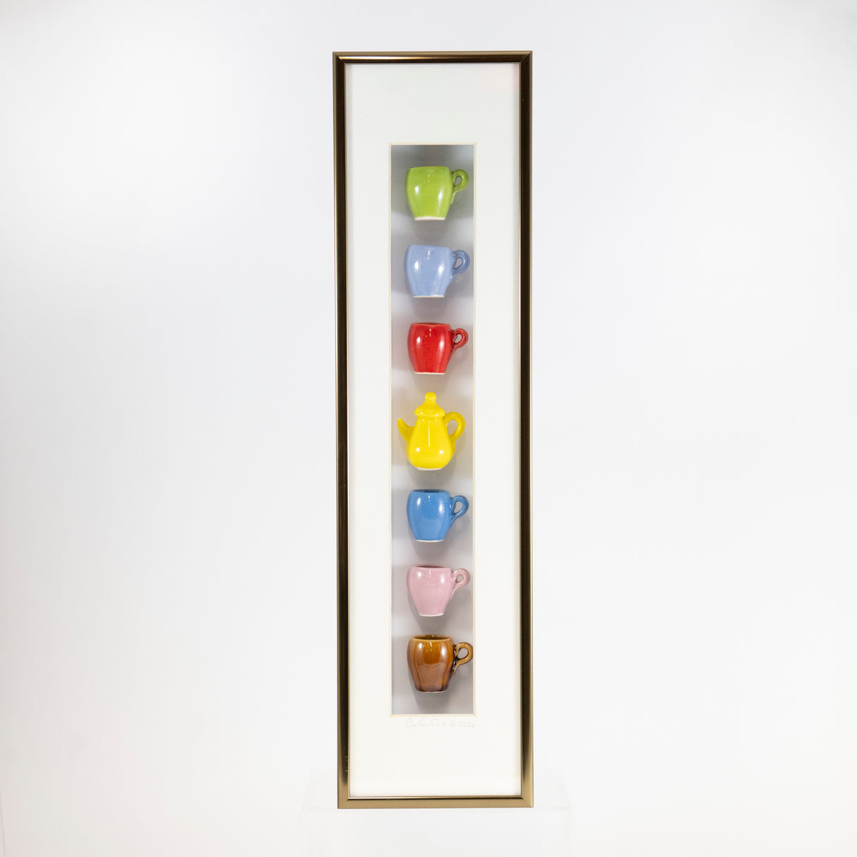 4x16 Vertical Shadowbox with a Yellow Teapot and a Red Mug in a Bronze Frame