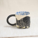 Floral Raccoon Mug with Blue Speckled Interior 2