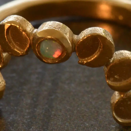 Whisper of the Moons Ring in Bronze with White Opal