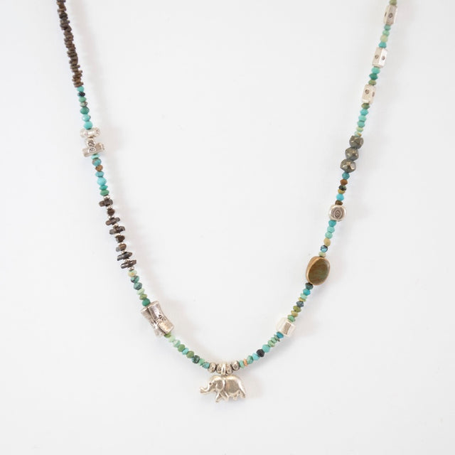 Silver Industrial Turquoise Necklace with Lucky Elephant from Riverstone Jewelry at Pinch in Northampton, MA