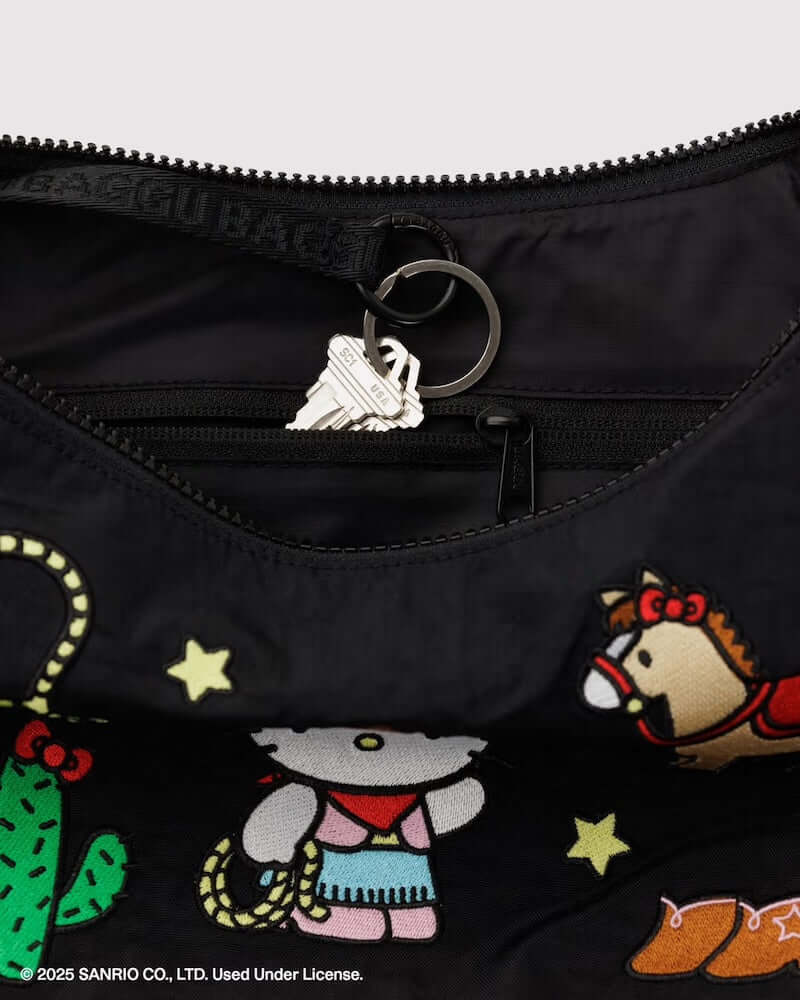 Embroidered Hello Kitty Western Medium Crescent Bag from Baggu at Pinch in Northampton, MA
