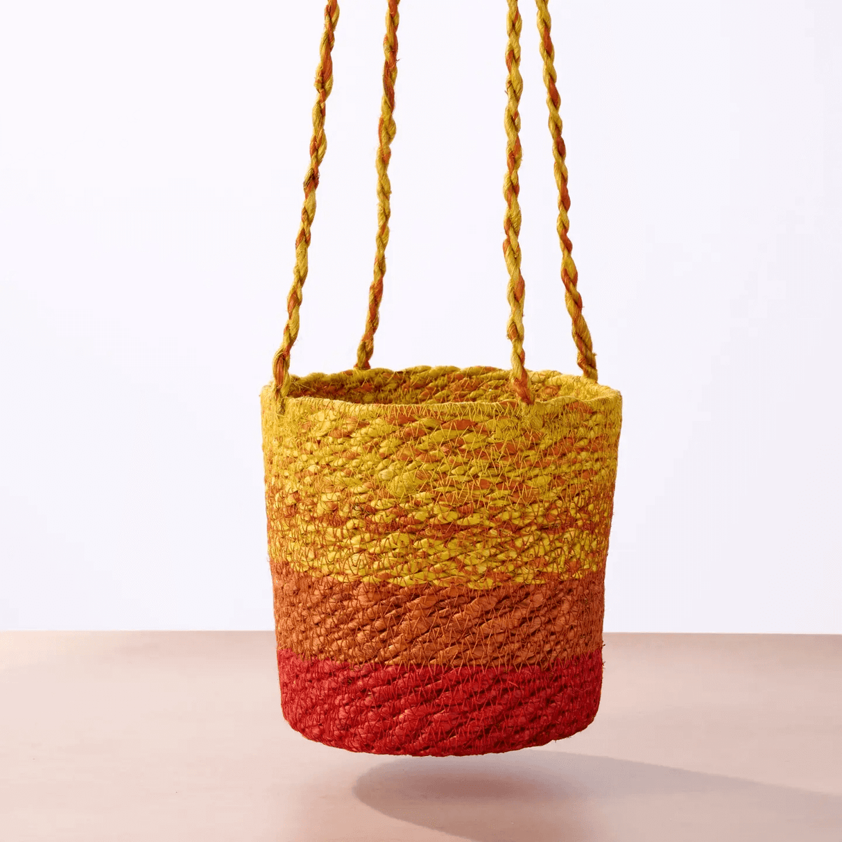 Buna Jute Plant Hanger in Red from Ten Thousand Villages at Pinch in Northampton, MA