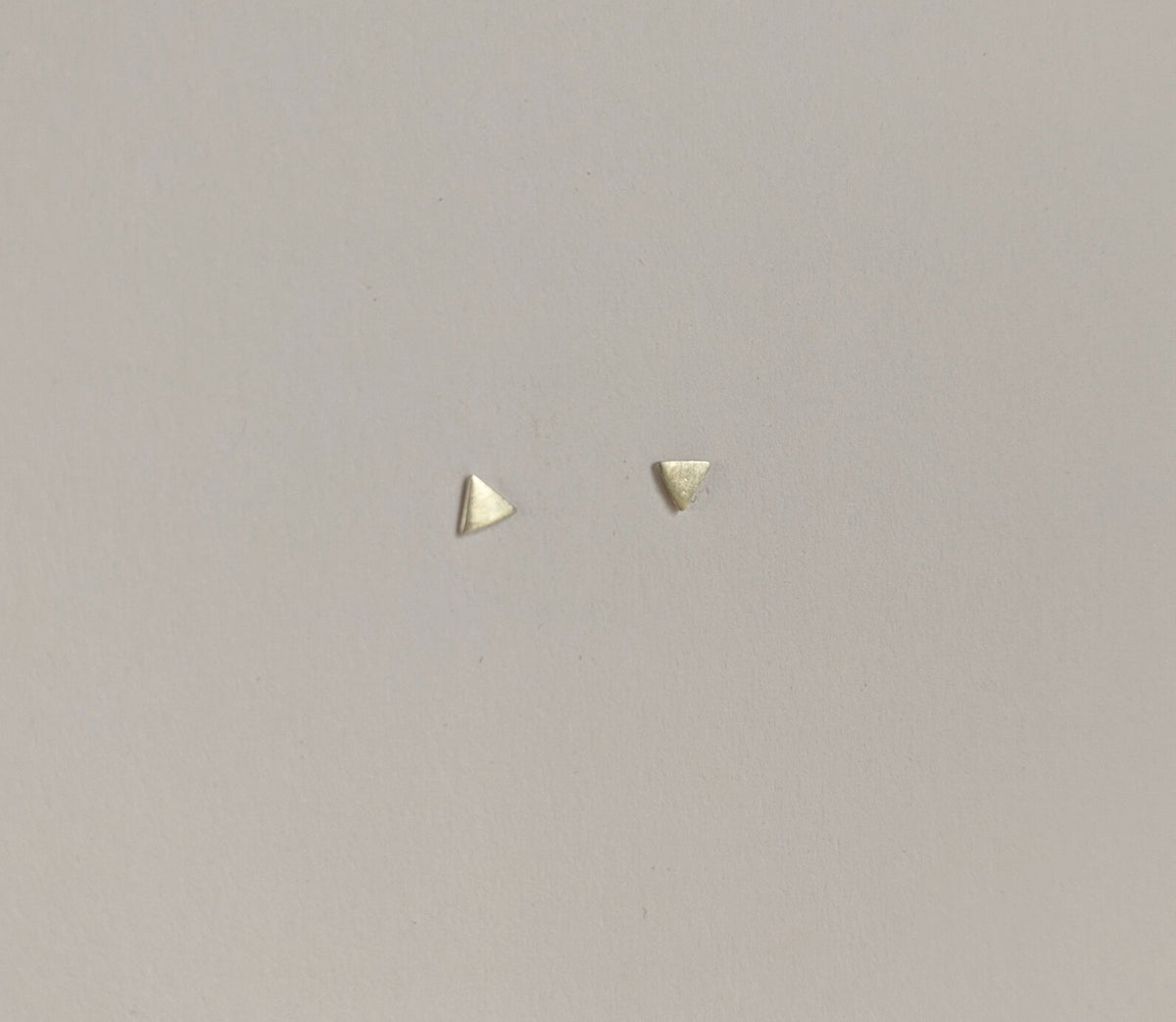 Tiny Tri Stud Earrings at PINCH